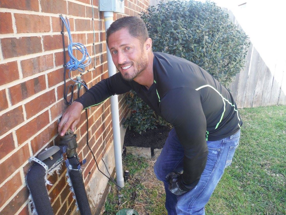 Elite Sprinkler on an irrigation repair at a Spring, TX home