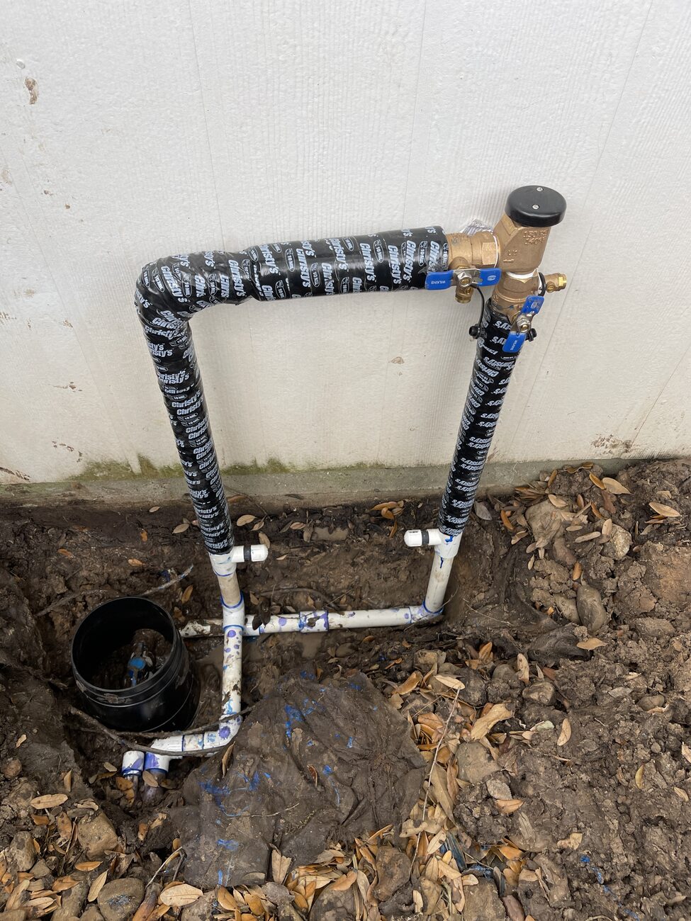 A tidy new irrigation valve assembly at a Memorial home