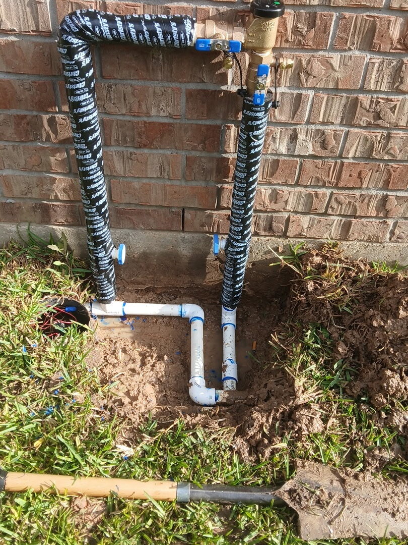 A rebuilt PVC valve manifold at a Katy home